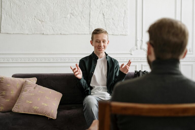 young adult talking to psychologist